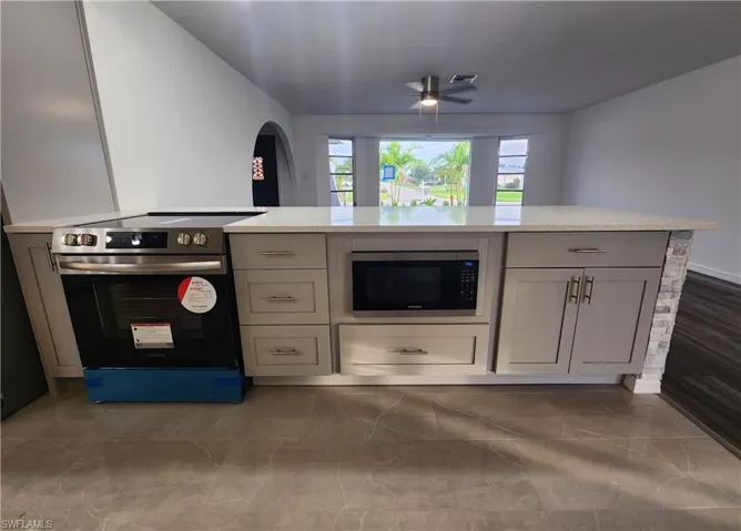More new appliances and tiled floor