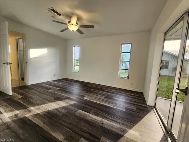 Master Bedroom With Slider to enclosed screen Lanai