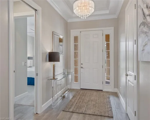 The Great Room features and upgraded tray ceiling with crown molding.