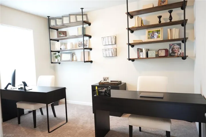 View of carpeted home office