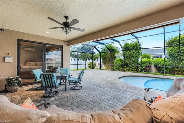 Beutifully enclosure, a patio area, and ceiling fan