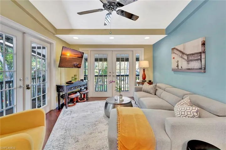 Multiple french doors lead to wrap around lanai