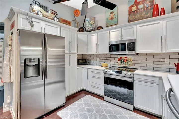 Heart of the home sits pretty with Sansumg applicanes, quartz & pantry pull-outs