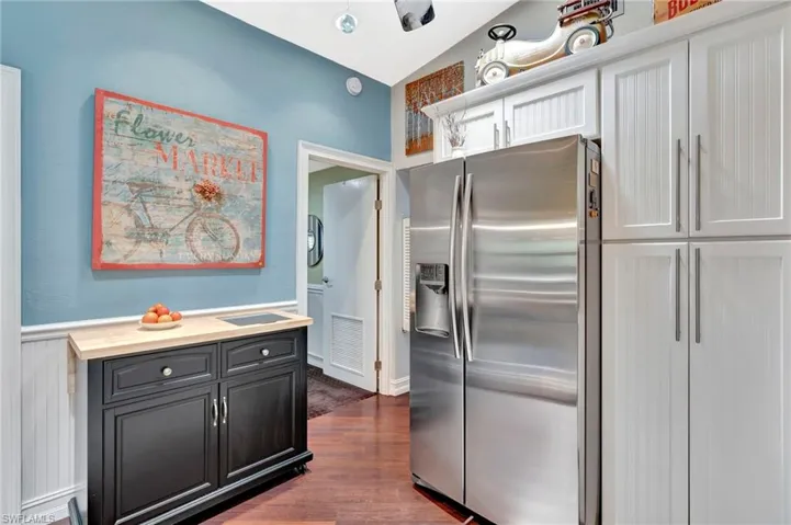 Moveable island, pantry to right of refrigerator has pull-outs