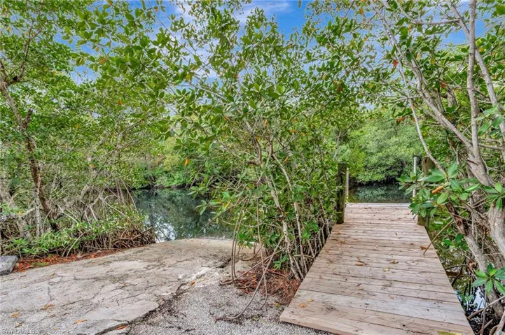 Community boat dock on Rock Creek with indirect access to the Gulf of Mexico