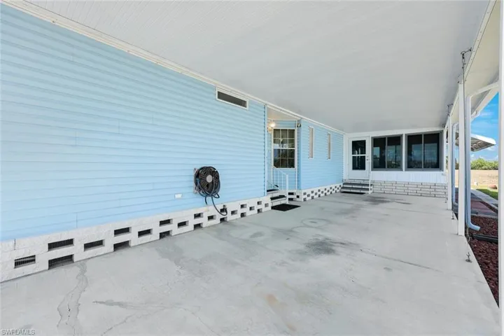New spacious carport provides covered parking for easy access and out of wet weather.