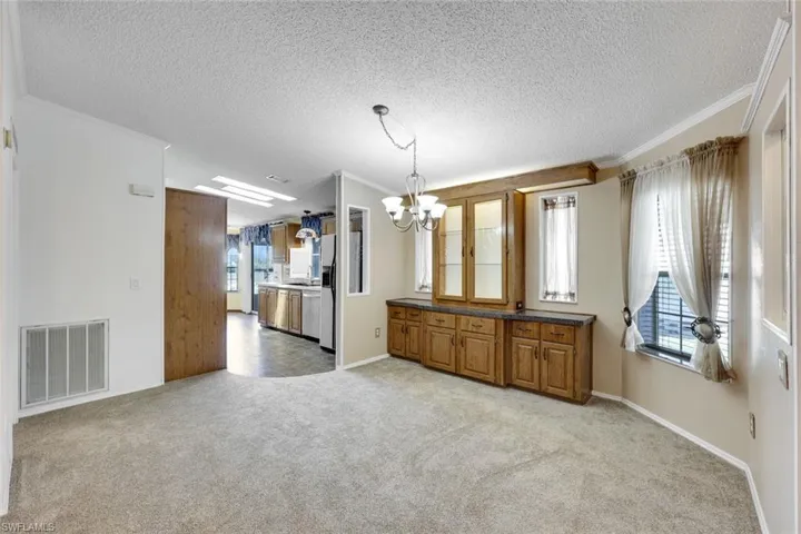 Built-in cabinetry in the Great Room provides extra storage.