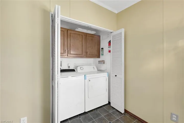 Washer and Dryer, conveniently located just off the Kitchen, are included in the sale.