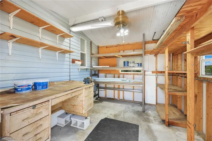 Immaculate Storage Shed off the rear patio provides extra storage and is a perfect "man cave."