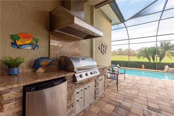 Under roof outdoor kitchen.