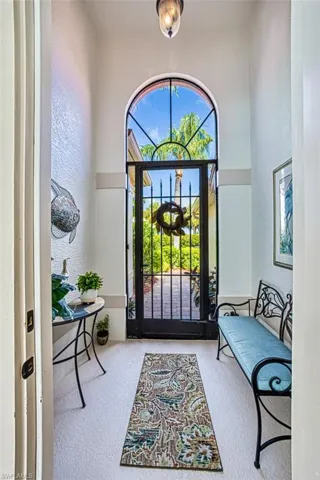 View of carpeted foyer