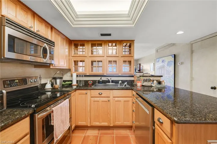 There is a large capacity sink & all stainless steel appliances