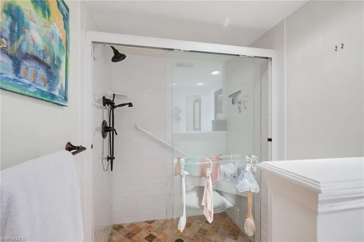 A very clean and bright white shower