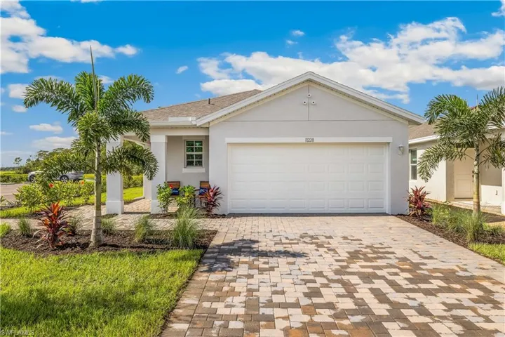 Single story home with a garage
