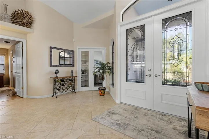 Foyer looking to den/office