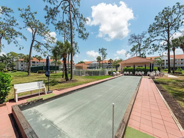 Surrounding community featuring a bocce ball area, a residential view, and a gazebo