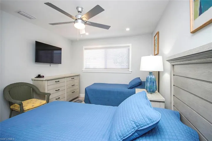 Bedroom featuring a ceiling fan and recessed lighting