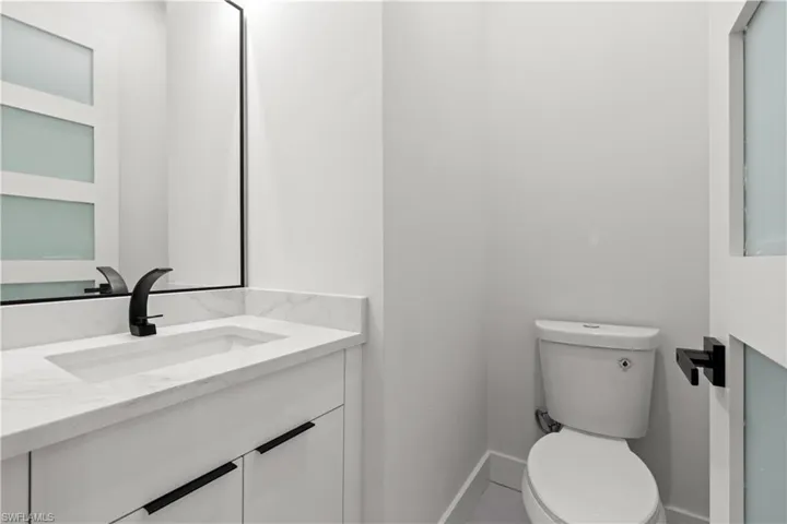 Bathroom with vanity and toilet