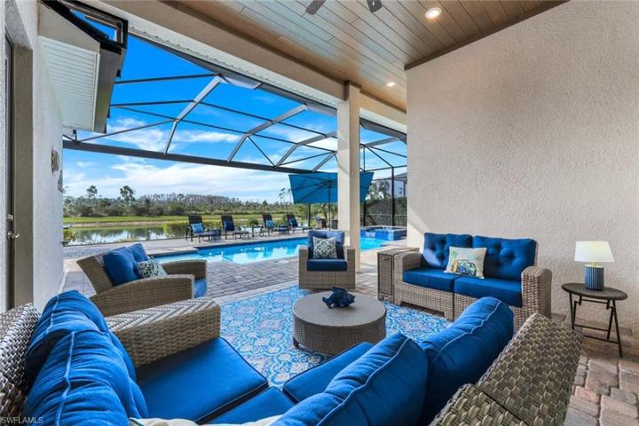 Relax and take in the water and preserve views on this sprawling lanai.