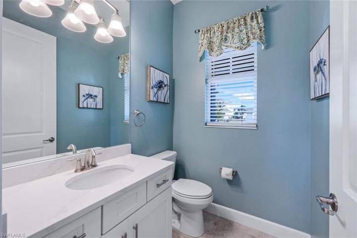 Additional Powder Room is located just off the great room.