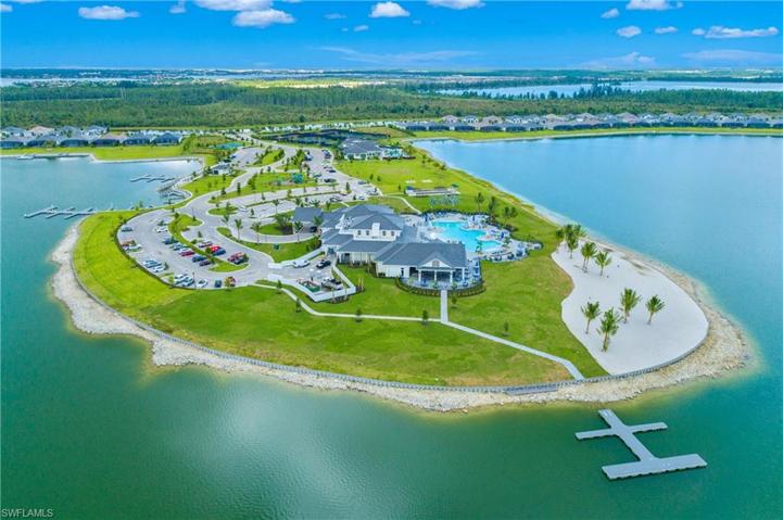 Wildblue's Social Club includes a lakeside beach, formal dining room, outdoor grille, resort style pool and interior gathering space.