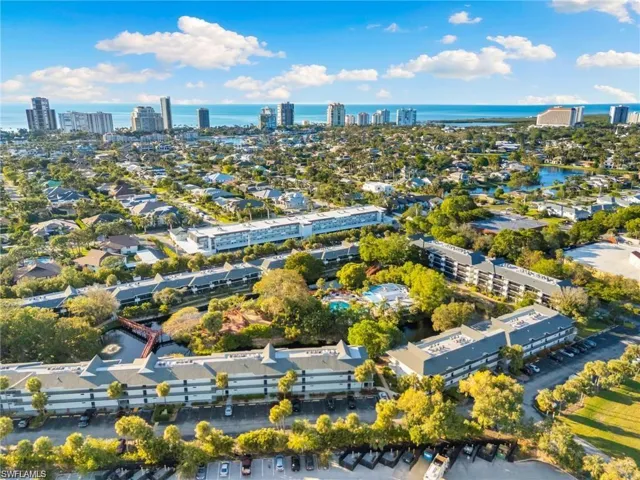 Bird's eye view with a water view and a city view