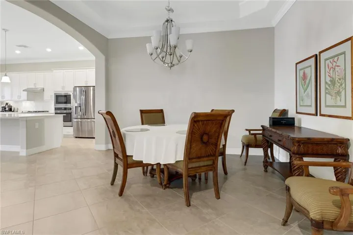Spacious dining room with tile floors