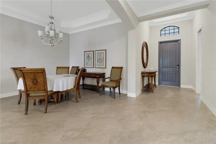 Dining room with an upscale chandelier