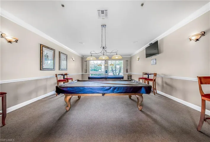 Rec room featuring ornamental molding and billiards