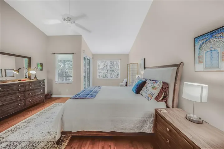 Bedroom featuring wood finished floors and a ceiling fan