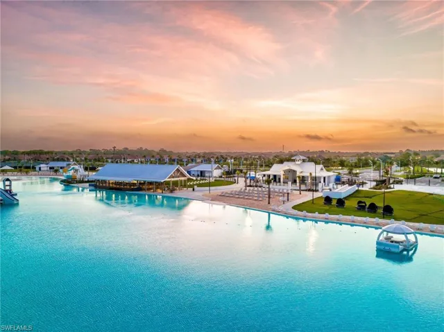 View of pool at dusk