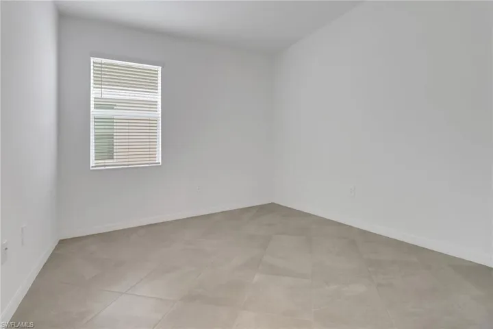 Spare room with baseboards