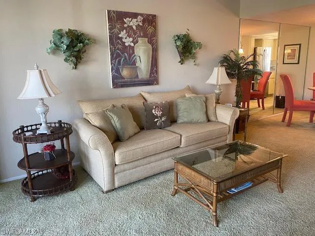 Living area featuring carpet