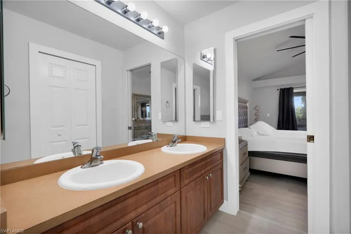Ensuite bathroom with ensuite bathroom and a sink