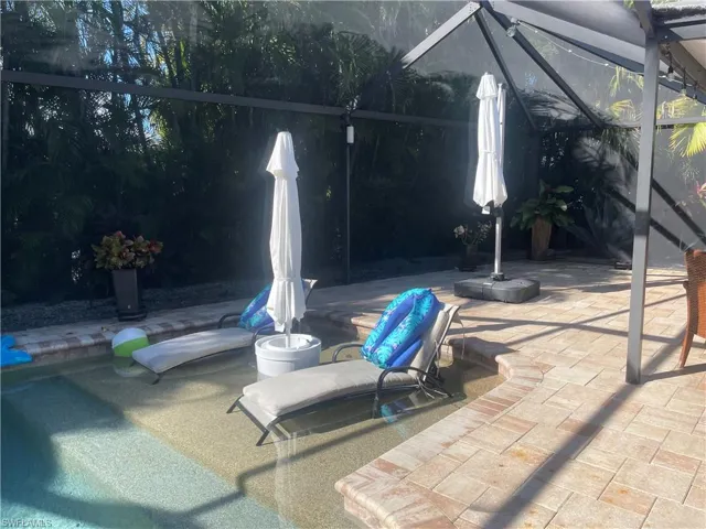 Pool with beach area