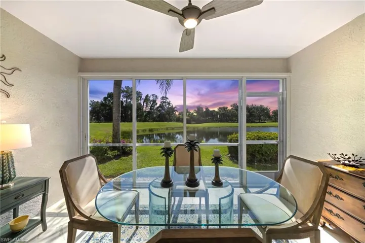 Screened in Patio with stunning lake, golf course, and preserve views.