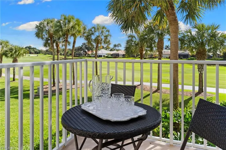 Balcony featuring golf course view