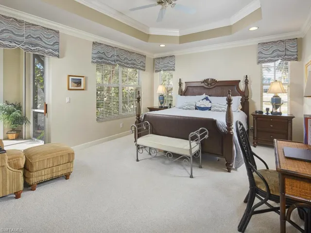 Expansive primary suite with direct lanai access.