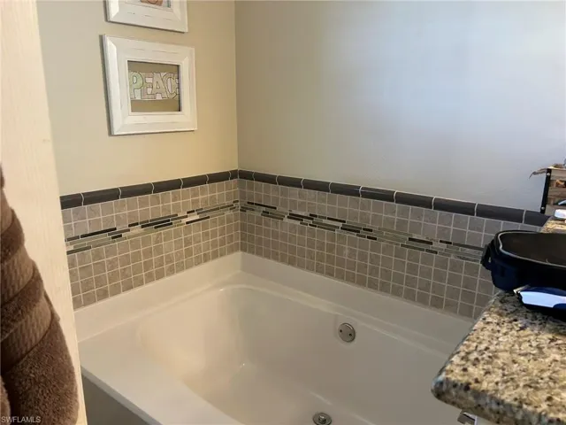 Bathroom featuring a tub