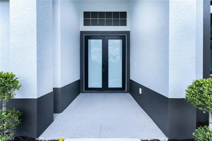 Property entrance with french doors