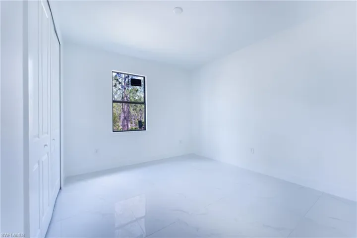 View of tiled empty room