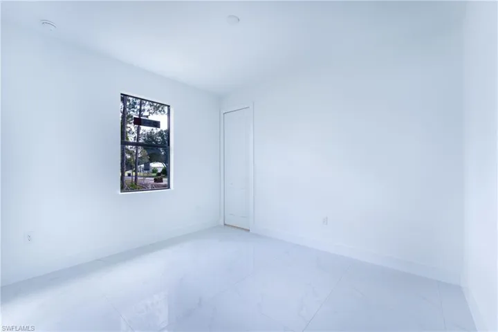 View of tiled empty room