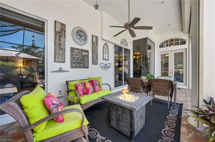 Covered lanai equipped with hurricane shutters. A must in Florida to escape the rain and/or sunshine on some days.  Eating Al Fresco is always an option!
