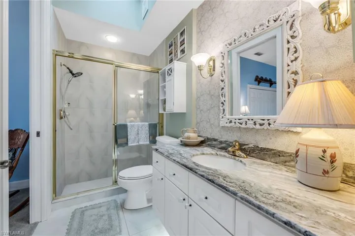 Guest bathroom located off the guest bedroom and hall area for use for visitors while entertaining.