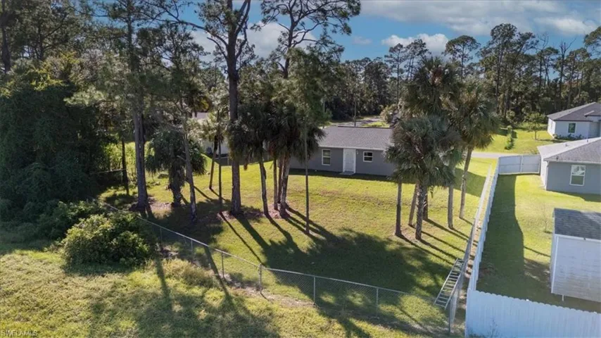 View of fenced backyard