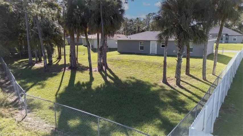 View of fenced backyard
