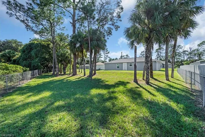 View of fenced backyard