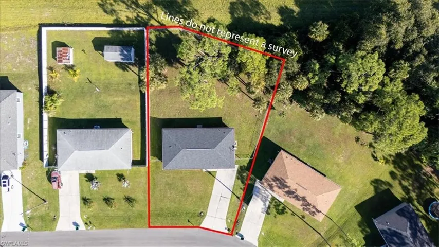 Aerial perspective of suburban area featuring property boundaries highlighted