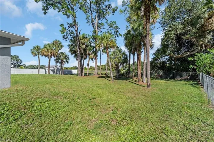 View of fenced backyard