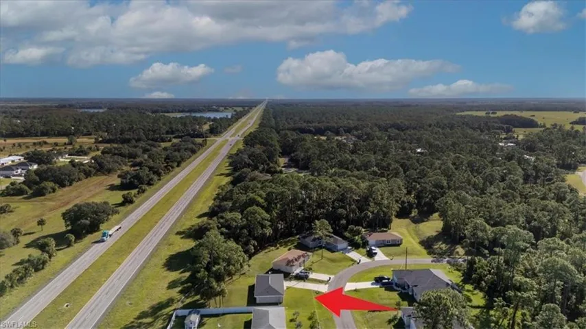 Aerial overview of property's location with a forest